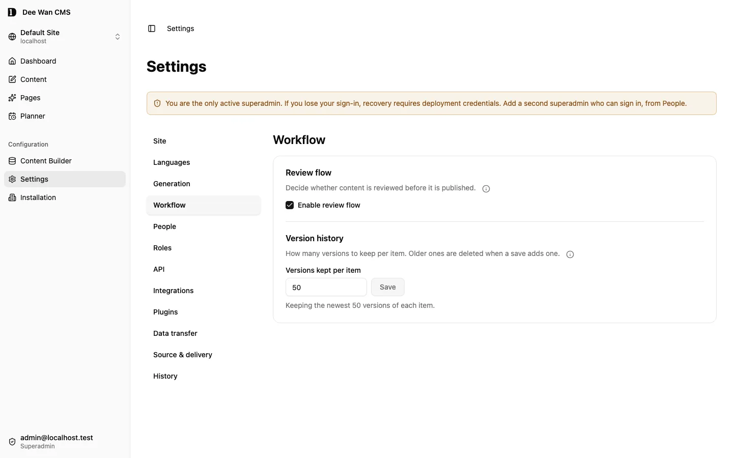 Workflow settings with review enabled and the version-history limit